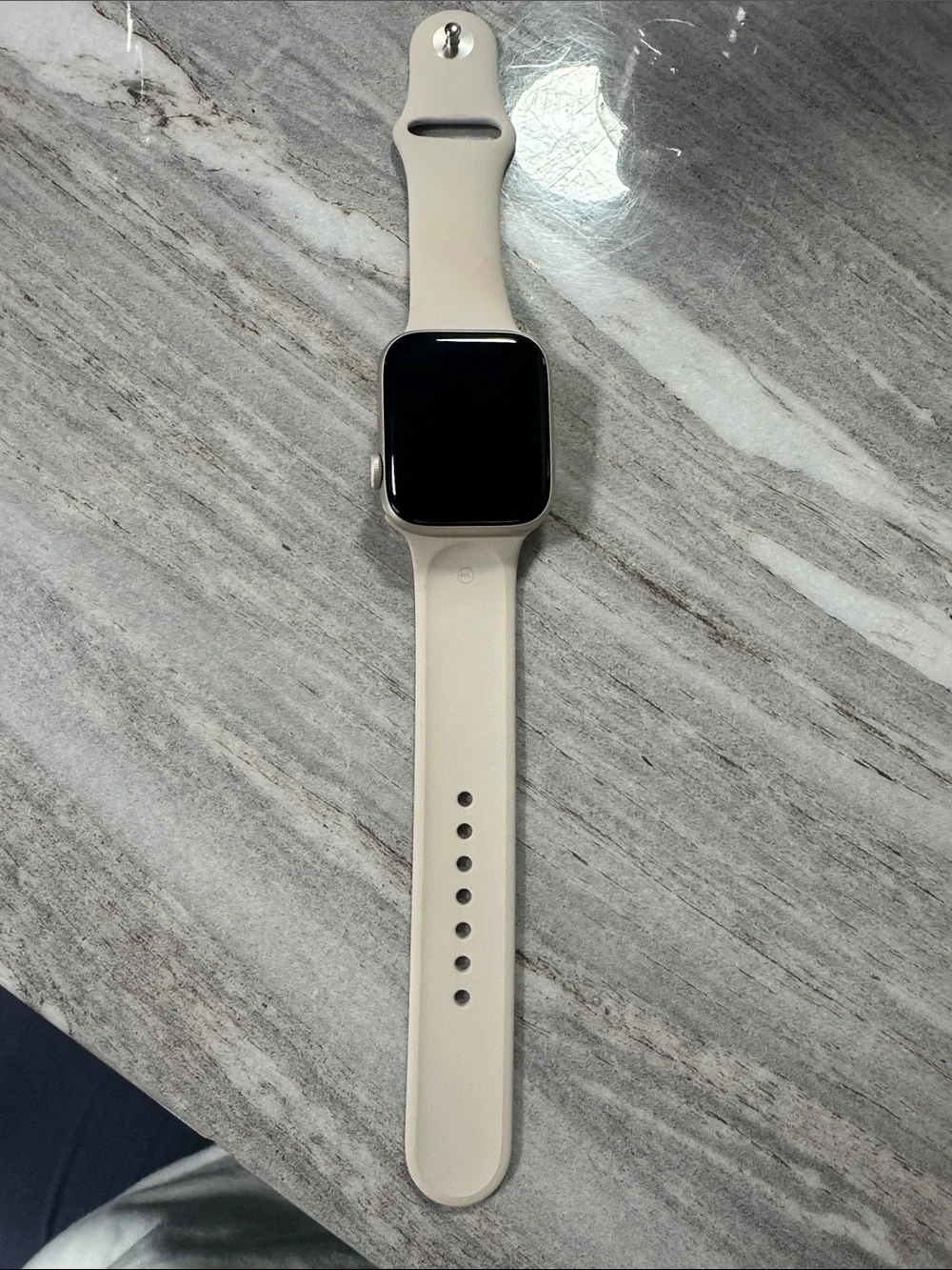 Apple Watch with Cream Sport Band